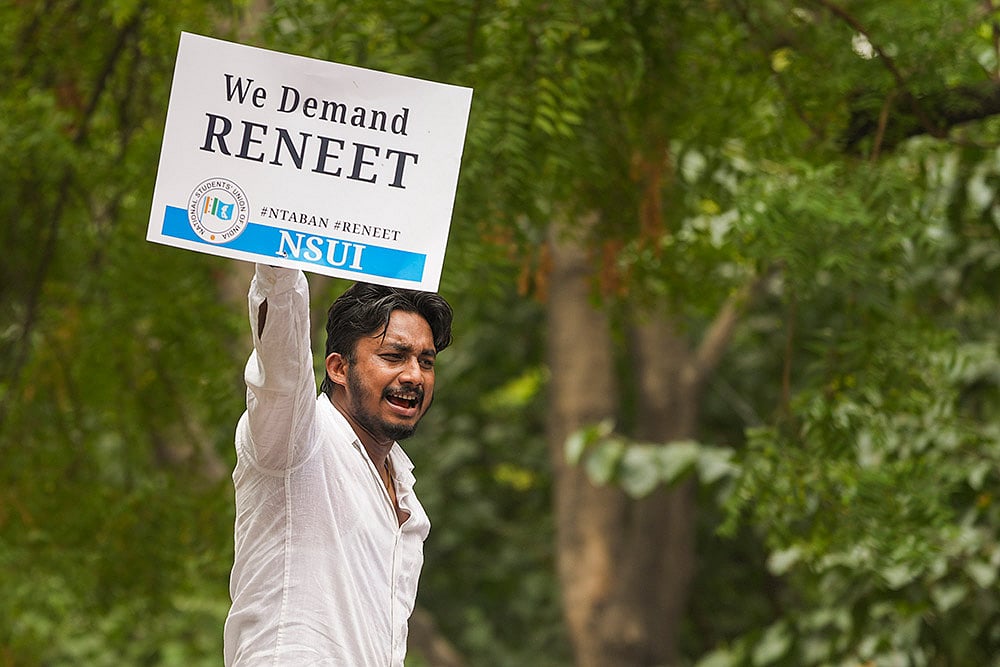 Photo: PTI/Ravi Choudhary : Protest over NEET