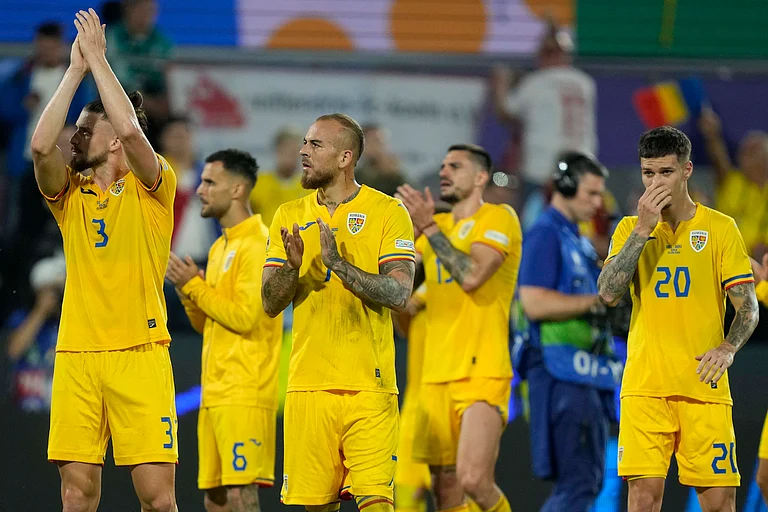 Romanian players applaud after a Group E match between Belgium and Romania at the Euro 2024 soccer tournament in Cologne, Germany, Saturday, June 22, 2024. - (AP Photo/Martin Meissner)