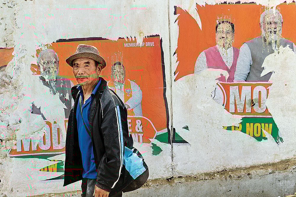 Photo: Sandipan Chatterjee : Unmet Demands: Torn campaign posters in Eastern Nagaland where there is a call for seperate statehood