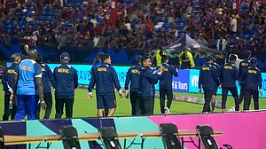 AP/Lynne Sladky : Nepal players walk around the field and gesture to fans after their men's ICC T20 World Cup 2024 match against Sri Lanka was abandoned due to rain at Central Broward Regional Park Stadium in Lauderhill, Florida on Wednesday (June 12).