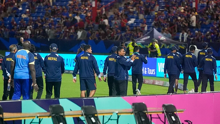 Nepal players walk around the field and gesture to fans after their men's ICC T20 World Cup 2024 match against Sri Lanka was abandoned due to rain at Central Broward Regional Park Stadium in Lauderhill, Florida on Wednesday (June 12). - AP/Lynne Sladky