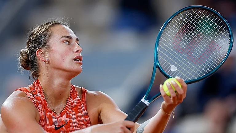 Aryna Sabalenka prepares to serve - | Photo: AP/Jean-Francois Badias