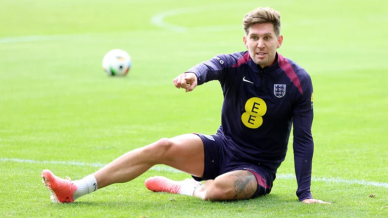 John Stones missed England training on Wednesday through illness - null