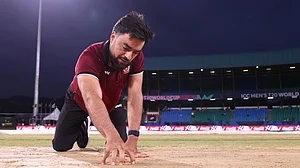 ICC : Rashid Khan inspects the pitch ahead of the Afghanistan vs Bangladesh, ICC T20 World Cup 2024 Super 8 match in St Vincent.