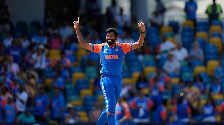 India's Jasprit Bumrah celebrates the dismissal of Afghanistan's Najibullah Zadran during the ICC Men's T20 World Cup cricket match between Afghanistan and India at Kensington Oval in Bridgetown, Barbados. - AP Photo/Ricardo Mazalan