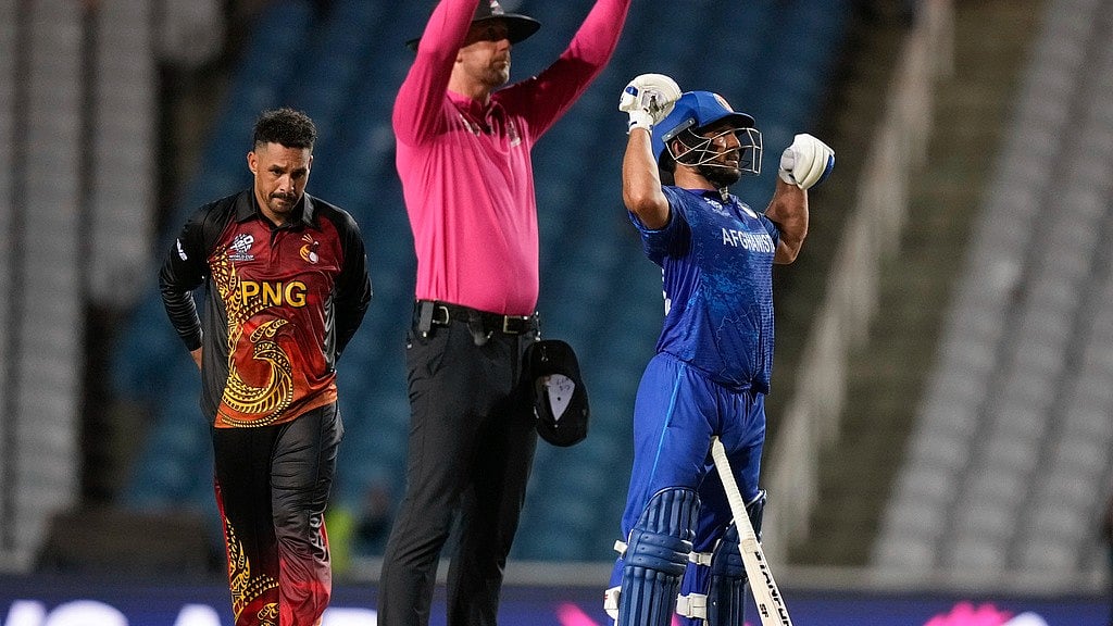 Photo: AP/Ramon Espinosa : Gulbadin Naib celebrates after hitting the winning six for Afghanistan against Papua New Guinea in their ICC T20 World Cup 2024 match in Trinidad on June 14.