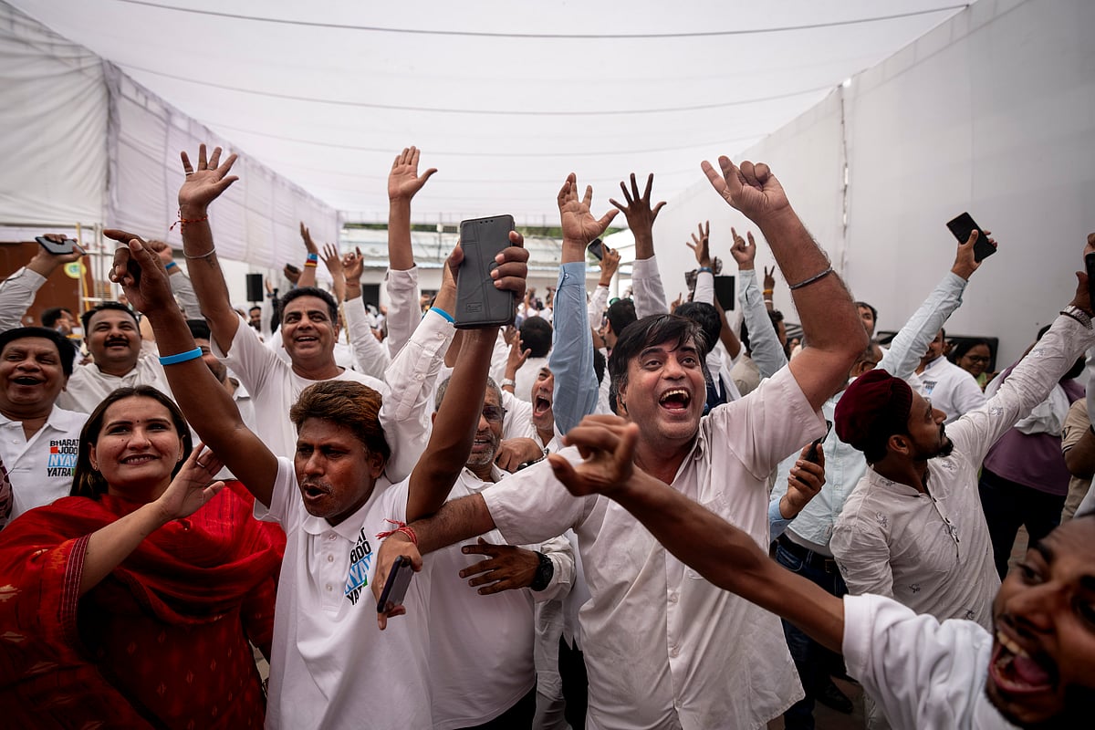 Congress party supporters cheer as they follow proceedings of vote counting at their party headquarters in New Delhi, June 4, 2024. - AP