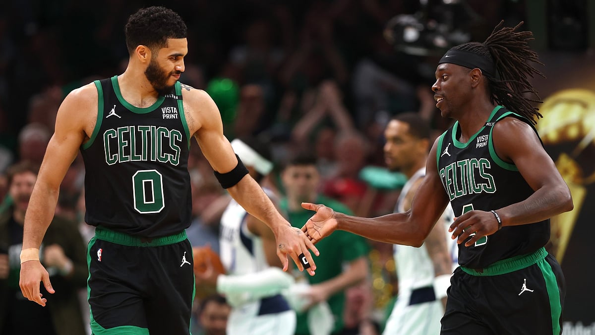 Jayson Tatum (left) and Jrue Holiday of the Boston Celtics celebrate during Game 2 of the 2024 NBA Finals. - null