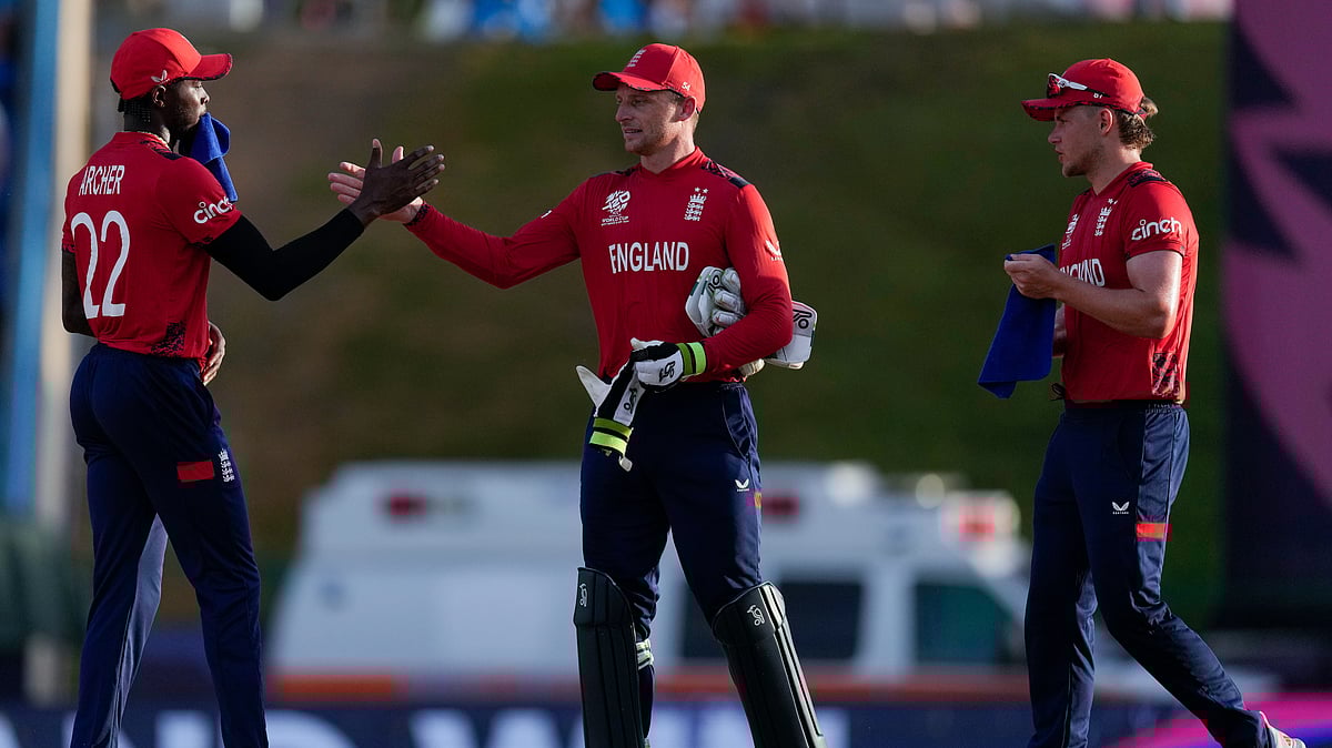 Jofra, Jos and Curran for England. AP Photo