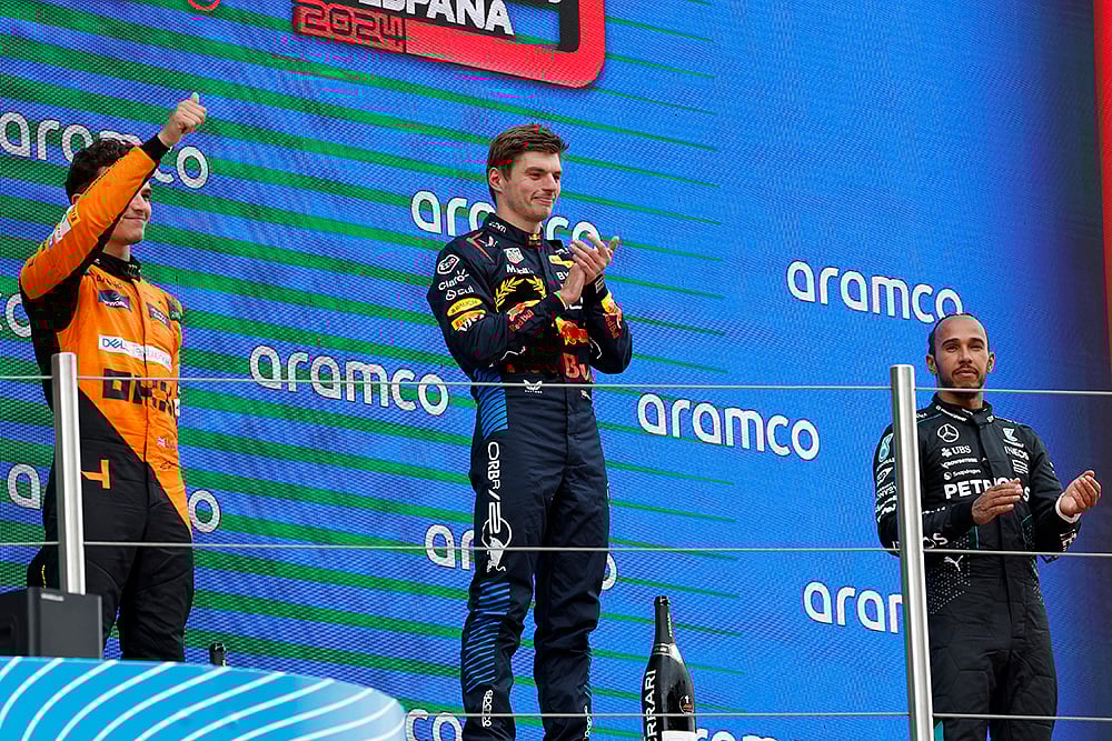 | Photo: AP/Joan Monfort : Winner Max Verstappen with Lando Norris and Lewis Hamilton