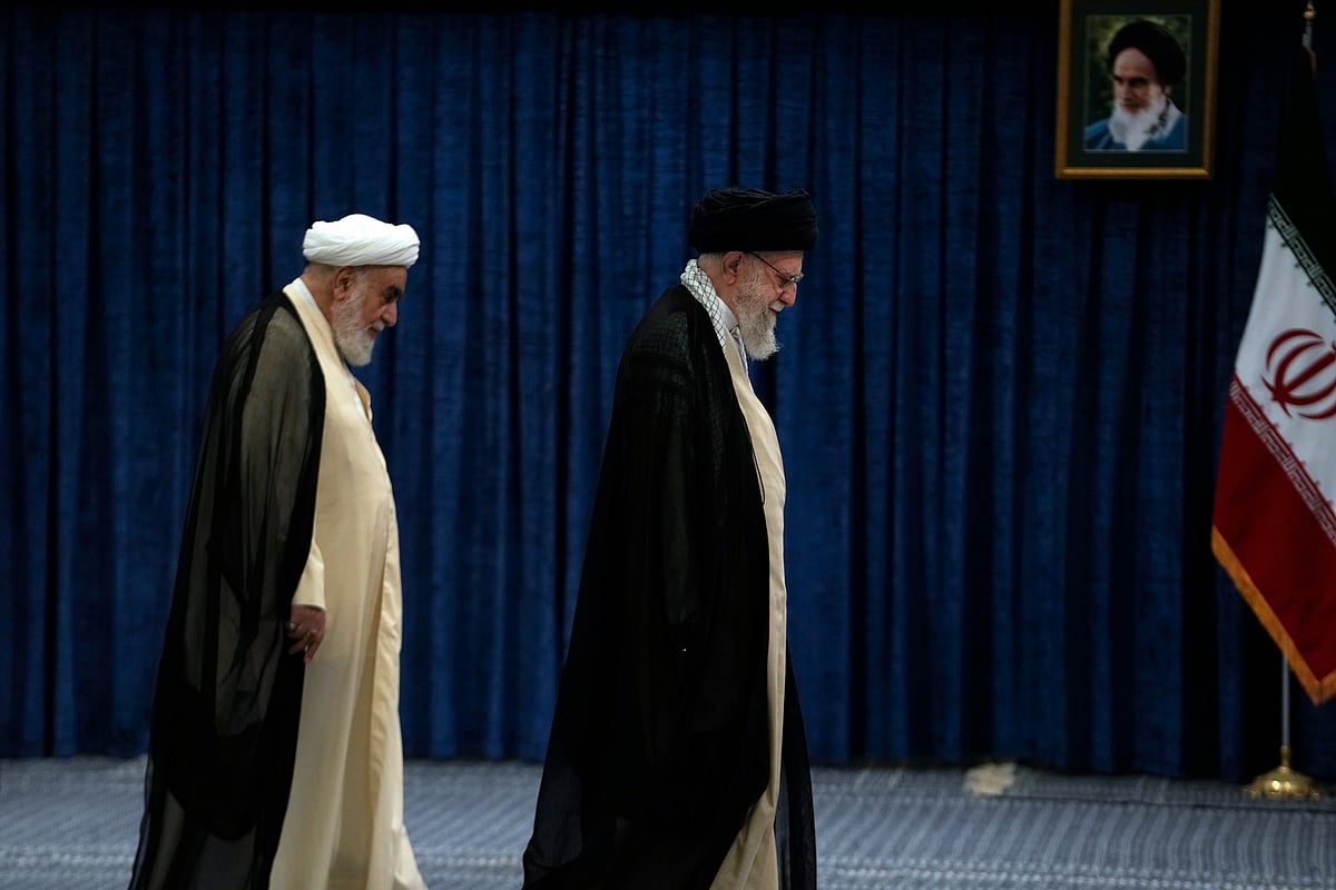 Iranian Supreme Leader Ayatollah Ali Khamenei, right, leaves after casting his vote during the presidential election as he is followed by head of his office Mohammad Mohammadi Golpayegani in Tehran, Iran, Friday, June 28, 2024. Iranians voted Friday in a snap election to replace the late hard-line President Ebrahim Raisi, with the race's sole reformist candidate vowing to seek "friendly relations" with the West in an effort to boost his campaign. - AP Photo/Vahid Salemi