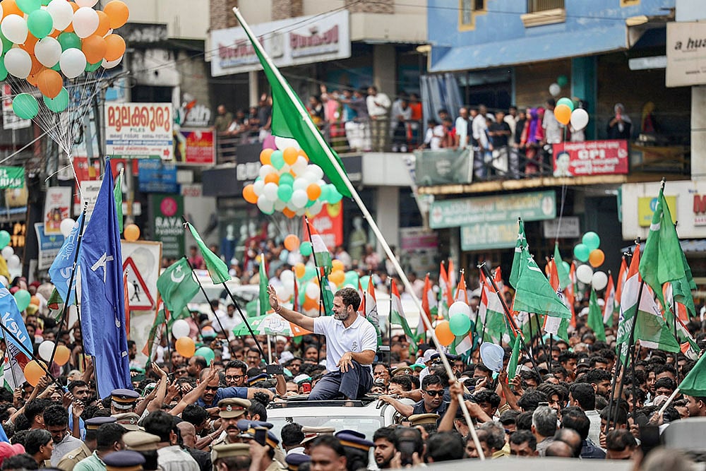 Photo: PTI : Rahul Gandhi roadshow in Kerala
