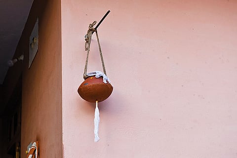 A clay pot, part of the funeral rites, at the deceased bus driver Vijay Kumar’s home