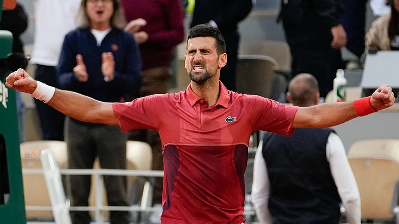 Novak Djokovic celebrates win, French Open 2024 round of 16, AP photo