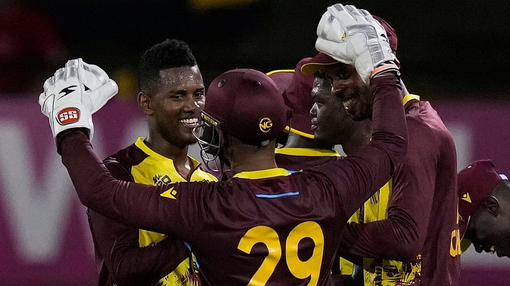 AP/Ramon Espinosa : West Indies players celebrate during their T20 World Cup 2024 match against Uganda.