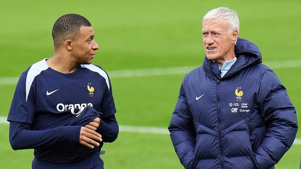 France head coach Didier Deschamps, right, speaks with his player Kylian Mbappe during a training session in Paderborn, Germany, Wednesday, June 12, 2024. France will play against Austria during their Group D soccer match at the Euro 2024 soccer tournament on June 17.  - AP/Hassan Ammar