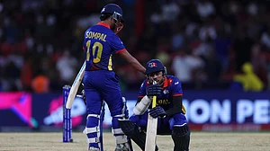 Photo: X/ @T20WorldCup : Nepal players Sompal Kami (L) and Gulsan Jha after they lost the match against South Africa by one run in ICC T20 World Cup 2024.