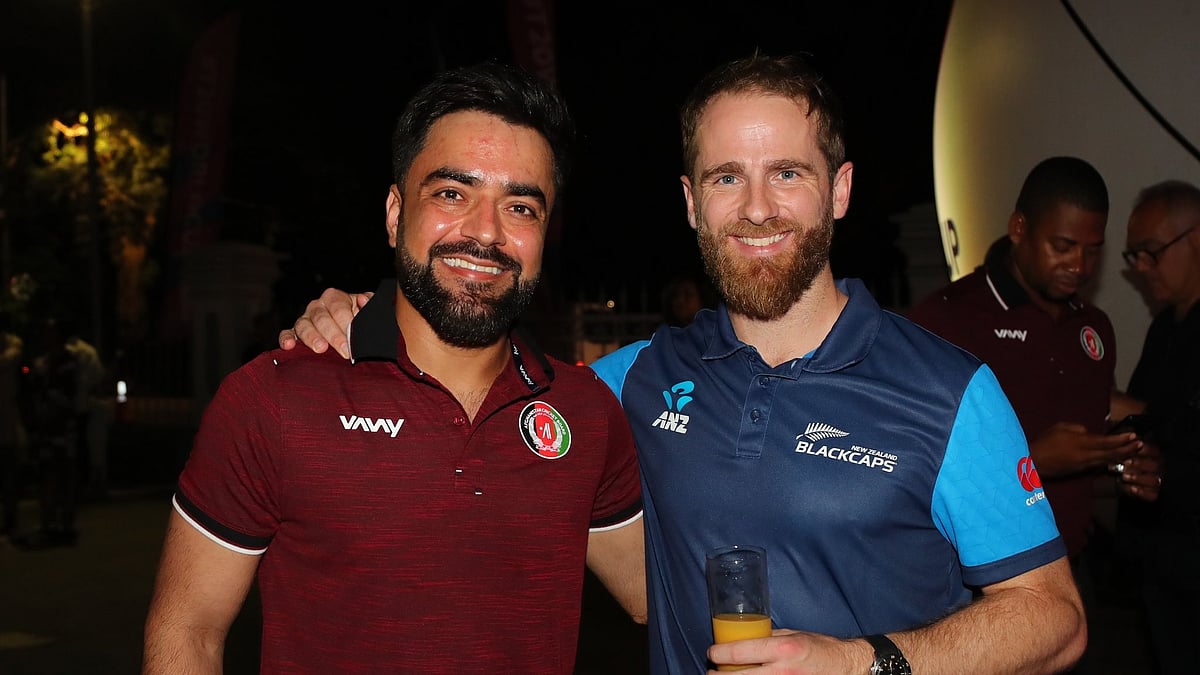 Photo: X/ @BLACKCAPS : Kane Williamson (R) with Afghanistan skipper Rashid Khan.