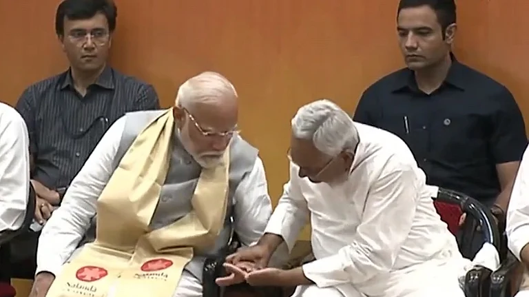 Nitish Kumar Grabs PM's Inked Finger At Nalanda Opening | - PTI Screengrab