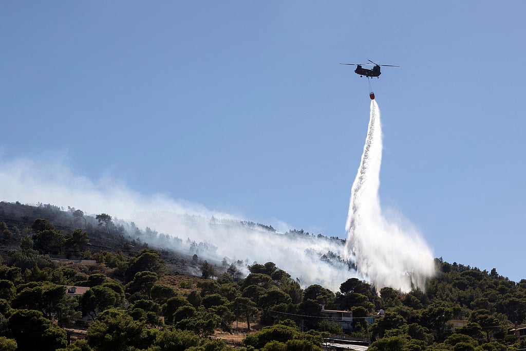AP  : Greece Wildfires: Firefighters Battle 2 New Fires Amid Strong Winds