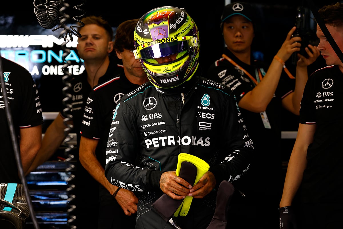 (AP Photo/Joan Monfort)


 : Mercedes driver Lewis Hamilton of Britain prepares at his box during the 2nd practice session for the Formula 1 Spanish Grand Prix at the Barcelona Catalunya racetrack in Montmelo, near Barcelona, Spain, Friday, June 21, 2024. The race will be held on Sunday. 