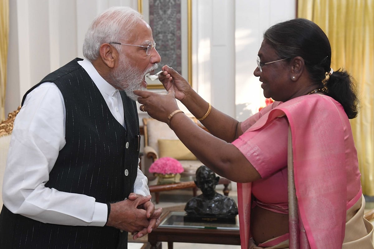 President Droupadi Murmu on Friday fed Modi 'dahi cheeni' (curd and sugar) which is considered auspicious in Indian tradition before undertaking important tasks or starting a new venture
 - null