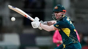 Photo: AP/Lynne Sladky : David Warner bats during the Australia vs Bangladesh, ICC T20 World Cup 2024 match in Antigua.