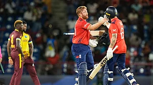 Photo: AP/Ramon Espinosa : Jonny Bairstow and Phil Salt celebrate England's win against West Indies in their ICC T20 World Cup 2024, Super Eight Group 2 match in St Lucia on Thursday (June 20).