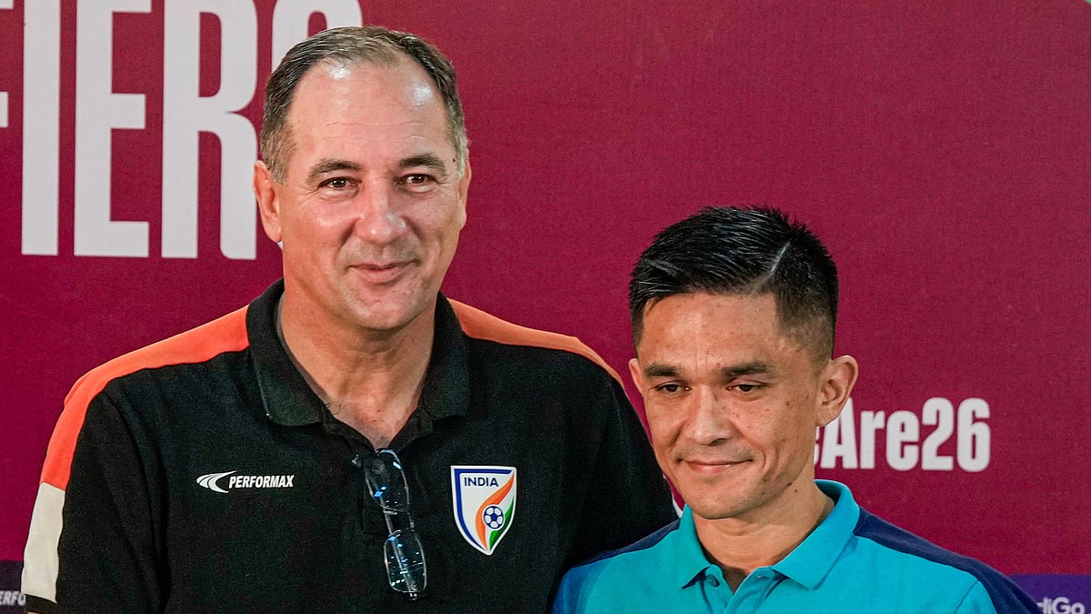 Indian national football team captain Sunil Chhetri and coach Igor Stimac pose for photos during an interaction with the media prior to the FIFA World Cup 2026 and AFC Asian Cup 2027 preliminary joint qualification round two match between India and Kuwait, at Vivekananda Yuba Bharati Krirangan (Salt Lake Stadium), in Kolkata. - PTI Photo/Swapan Mahapatra
