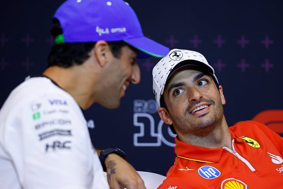 Ferrari driver Carlos Sainz of Spain, right, speaks with RB team driver Daniel Ricciado of Australia during a press conference at the Barcelona Catalunya racetrack in Montmelo, near Barcelona, Spain, Thursday June 20, 2024. The Spanish Grand Prix Formula One race will be held on Sunday.


 -  (AP Photo/Joan Monfort)