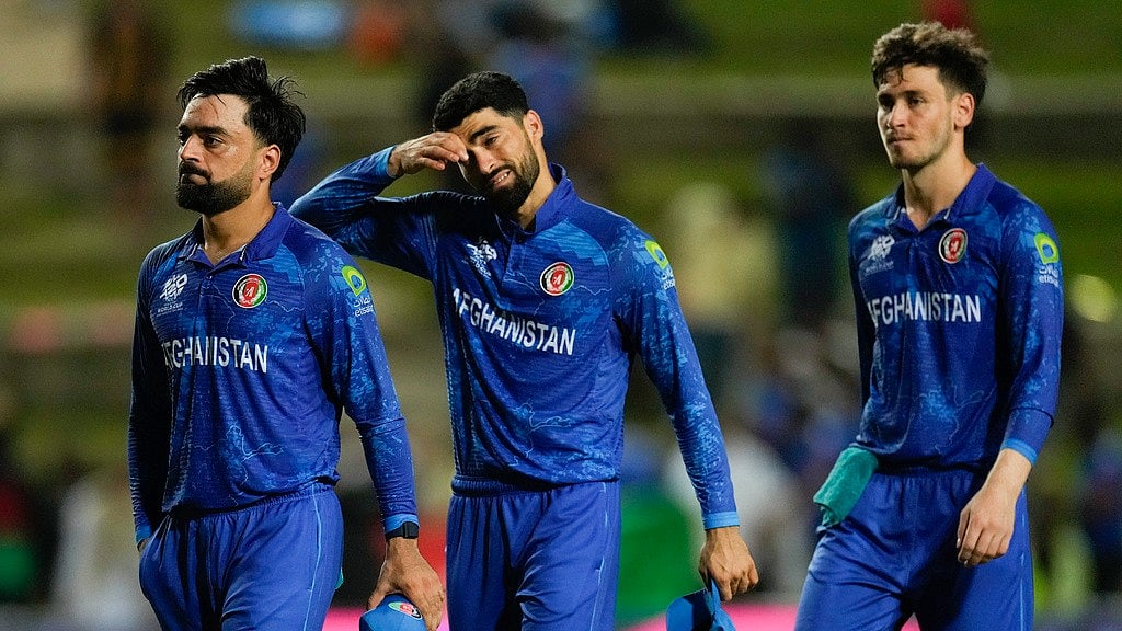 Afghanistan captain Rashid Khan and teammates walk off after losing to South Africa in their ICC T20 World Cup 2024 semi-final clash in Trinidad on Thursday (June 27). - AP/Ricardo Mazalan