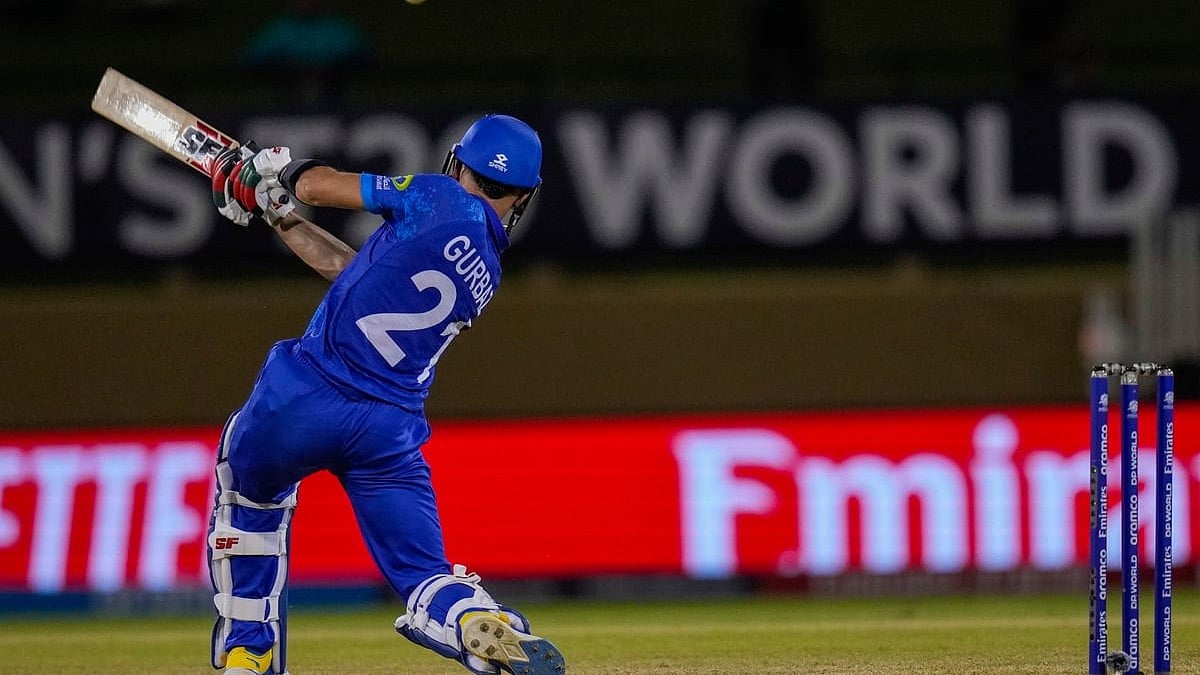 Photo: AP/PTI : Afghanistan's Rahmanullah Gurbaz plays a shot for four runs on his way to score a half-century against Uganda during an ICC Men's T20 World Cup cricket match at Guyana National Stadium in Providence, Guyana.