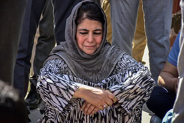 (Photo by Saqib Majeed via Getty Images) :  Former Chief Minister of Jammu and Kashmir and People's Democratic Party (PDP) candidate Mehbooba Mufti (C) sits-down before casting her ballot during the sixth general election phase, in Anantnag, about 70kms from Srinagar. 