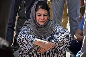 (Photo by Saqib Majeed via Getty Images) : Former Chief Minister of Jammu and Kashmir and People's Democratic Party (PDP) candidate Mehbooba Mufti (C) sits-down before casting her ballot during the sixth general election phase, in Anantnag, about 70kms from Srinagar.