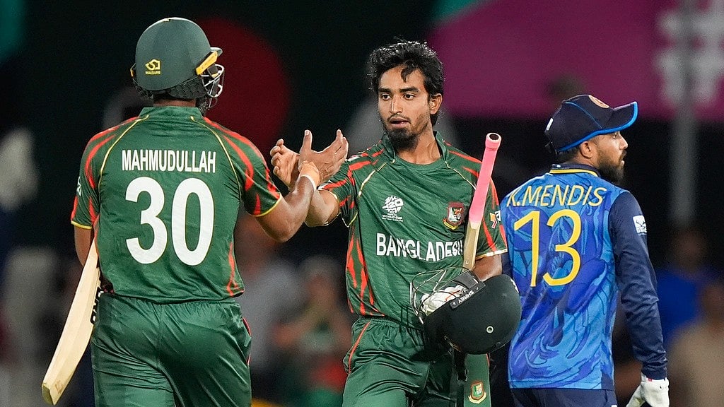 Photo: AP/LM Otero : Bangladesh's Tanzim Hasan and teammate Mahmudullah, left, react following their team's victory in the T20 World Cup 2024 match against Sri Lanka at the Grand Prairie Stadium in Texas on Saturday (June 8).
