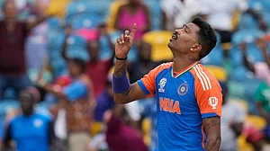 AP Photo/Ramon Espinosa : India's Hardik Pandya celebrates the wicket of South Africa's Kagiso Rabada during the ICC Men's T20 World Cup final cricket match between India and South Africa at Kensington Oval in Bridgetown, Barbados.
