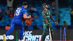 AP/Ricardo Mazalan : Naveen-ul-Haq dismisses Taskin Ahmed during the Afghanistan vs Bangladesh, ICC T20 World Cup 2024 match in Saint Vincent on Tuesday (June 25).