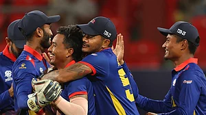 ICC : Sompal Kami celebrates a wicket with teammates during the Nepal vs Bangladesh, ICC T20 World Cup 2024 match in St Vincent on Monday (June 17).