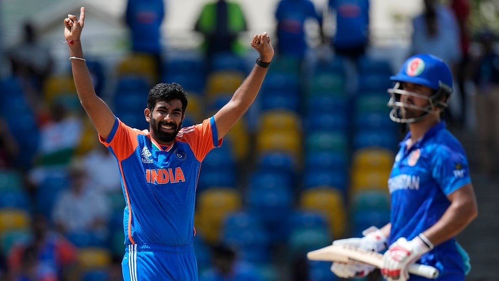 India's Jasprit Bumrah, left, celebrates the dismissal of Afghanistan's Najibullah Zadran during the ICC Men's T20 World Cup cricket match between Afghanistan and India at Kensington Oval in Bridgetown, Barbados, Thursday, June 20, 2024.  - AP/Ricardo Mazalan
