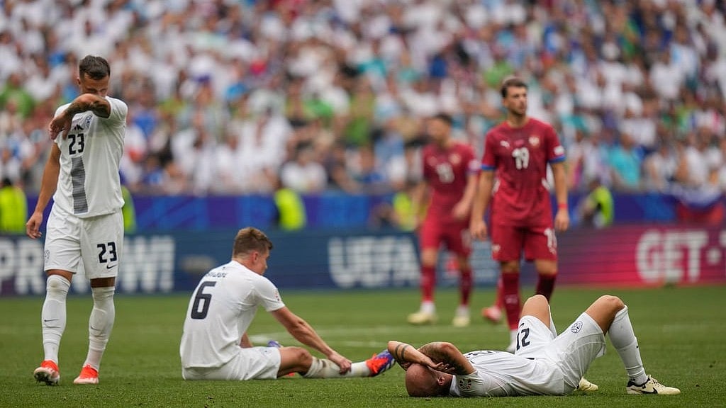 Slovenia's players react after the end of a Group C match between Slovenia and Serbia at the Euro 2024 soccer tournament in Munich, Germany, Thursday, June 20, 2024. The match ended 1-1 - AP