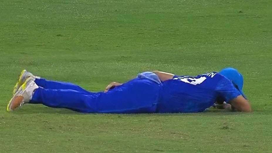 Disney+ Hotstar : Gulbadin Naib lies down in pain during AFG vs BAN Super 8 match.