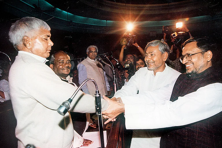 One man, many roles: Nitish Kumar with Lalu Yadav and Sushil Modi - File Photo