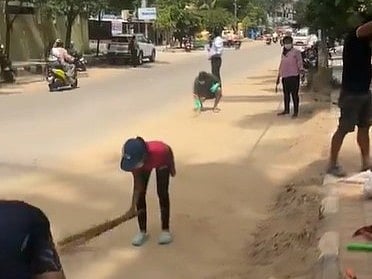 X/@bykarthikreddy : Several people wearing gloves and removing the silt build-up on the road with cleaning tools can be seen on visuals doing the rounds on social media.

