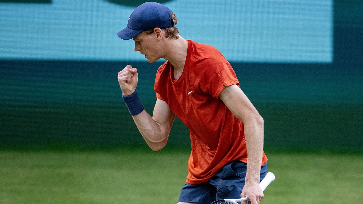 Jannik Sinner celebrates his semi-final win over Zhang Zhizhen