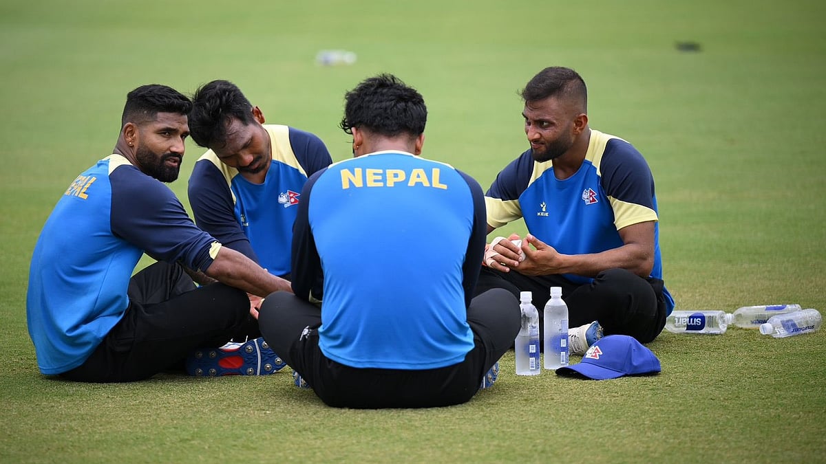  X/ @CricketNep : Nepal cricket team players resting during the practice session 
