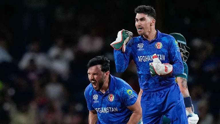 Afghanistan celebrate their victory over Australia in their ICC T20 World Cup 2024, Super Eights match in St Vincent. - AP/Ramon Espinosa