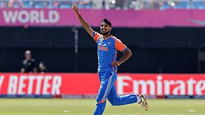 AP/Adam Hunger : IND Vs USA, T20 World Cup: Indian pacer Arshdeep Singh celebrates a wicket.