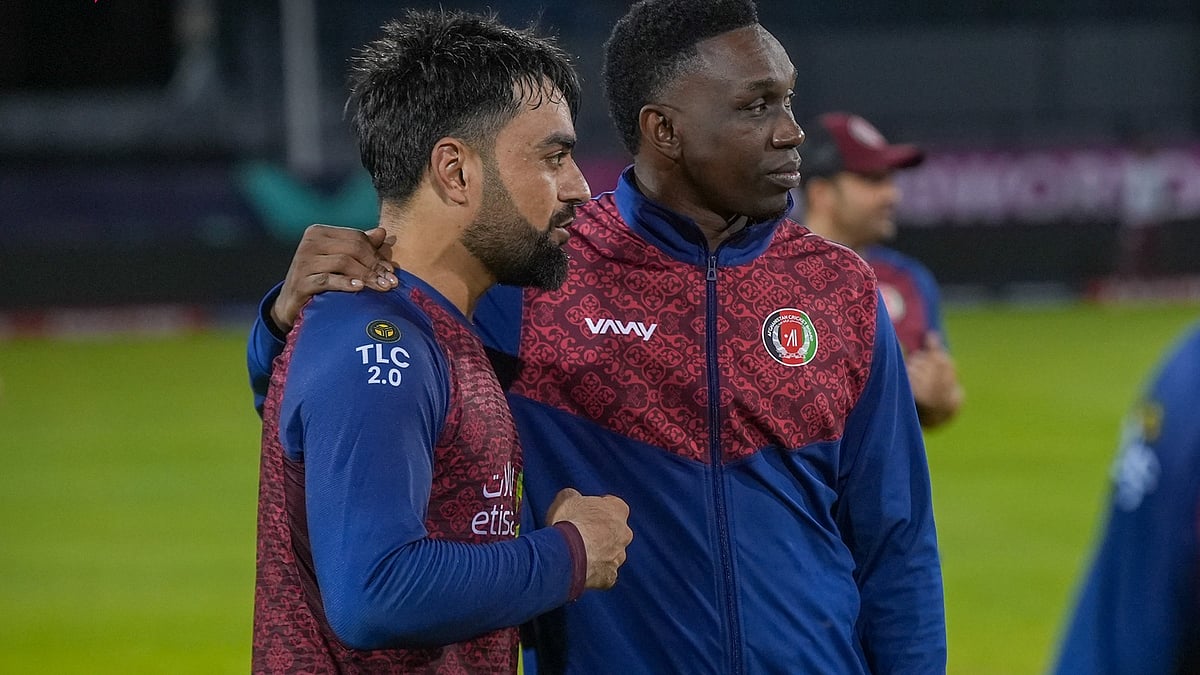 Rashid Khan, the Afghanistan skipper, with coach Dwayne Bravo - X/@ACB Media