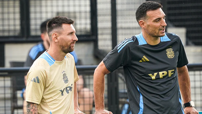 Scaloni (right) understand it cannot be easy for Messi to spend birthdays away from family - null