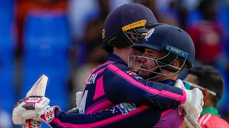 AP : Scotland celebrate their victory over Oman